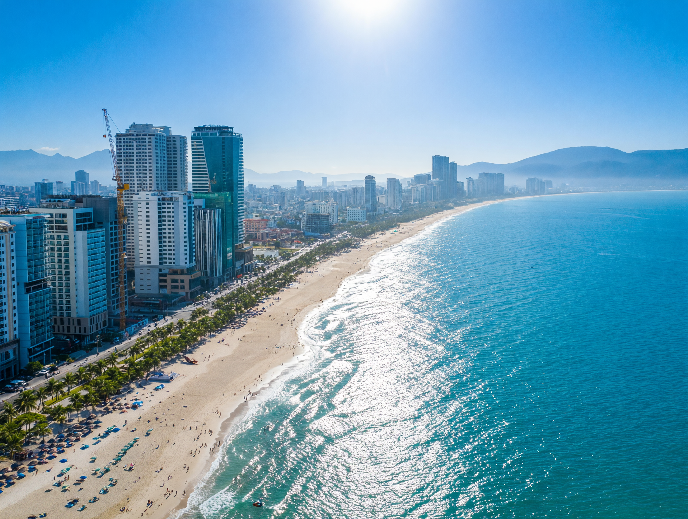 Golden Bridge at Ba Na Hills held by giant stone hands above misty mountains